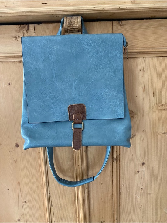 blue faux leather backpack Blue Faux Leather Backpack with Brown Accent Strap